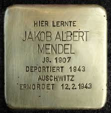 Example of a Stolperstein, or Stumbling Stone, in a pavement in a Berlin street