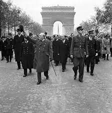 Winston Churchill and General de Gaulle on the Champs Elysees in Paris on Liberation Day, August 25th, 1944.